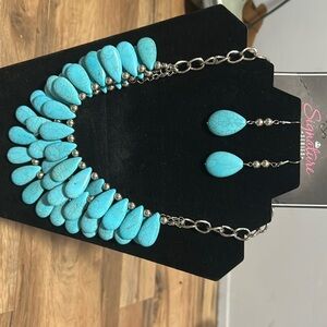 Paparazzi Jewelry. Signature piece $15 necklace and earrings together.